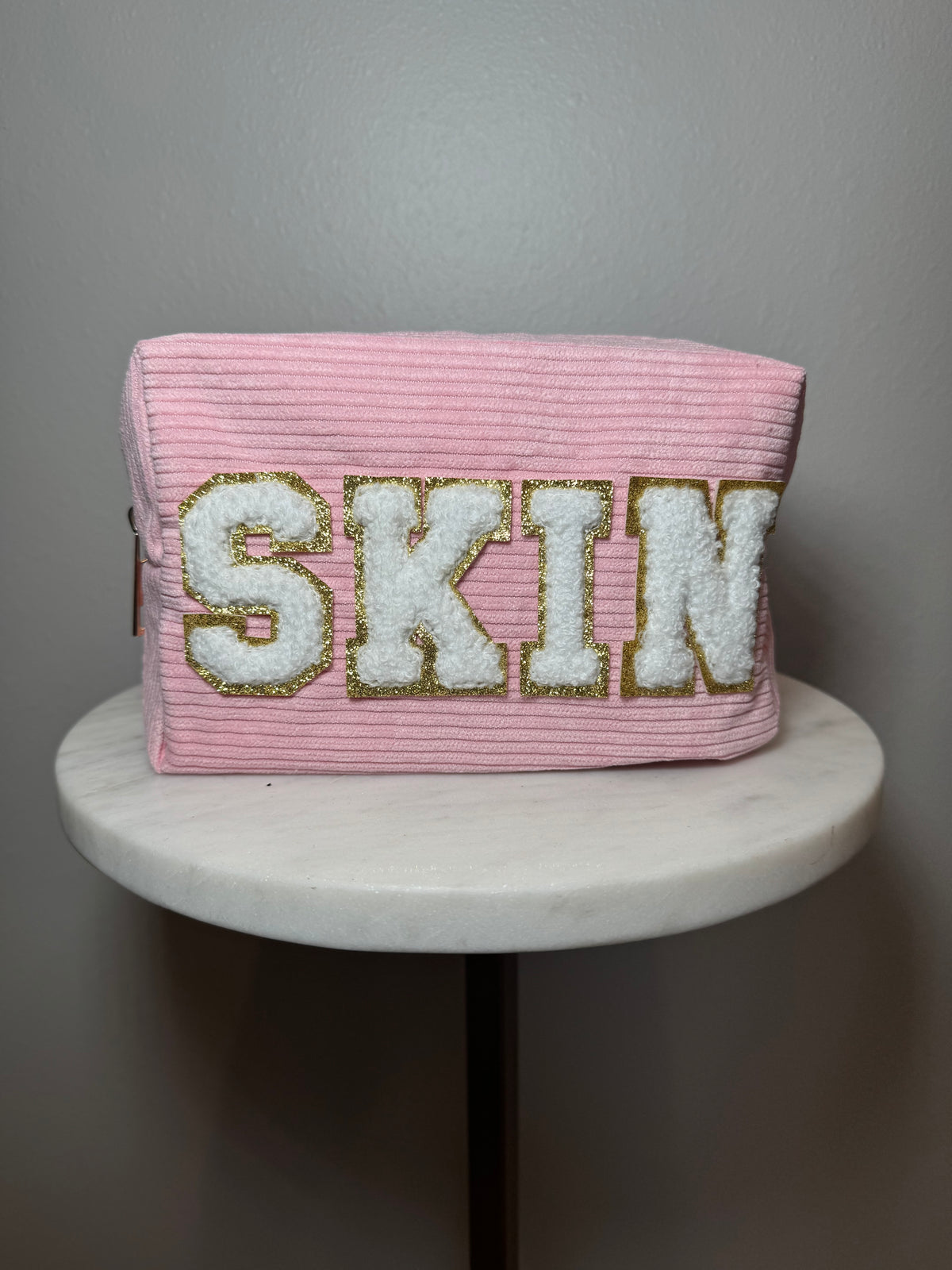 Pink 'skin' travel bag